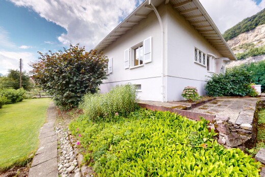 außenansicht mit property visible, stuckverkleidung, day time, und rasen