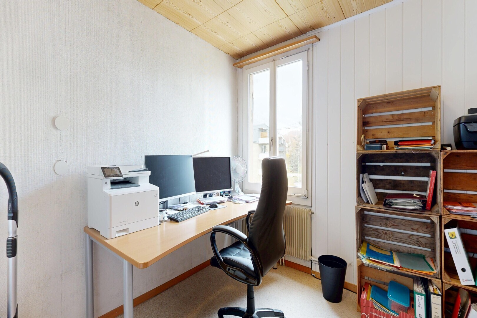 home office featuring radiator heating unit and wood ceiling
