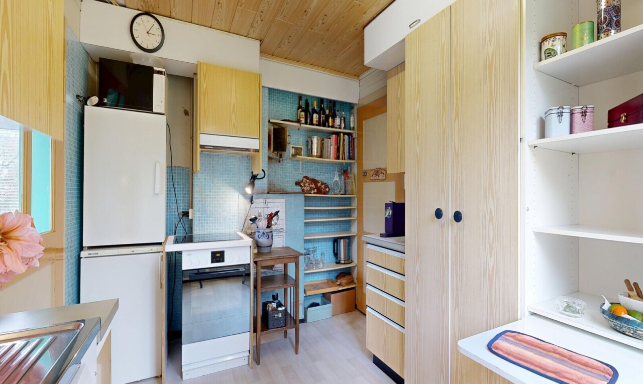 kitchen with light wood finish cabinetry, wood ceiling, backsplash, light wood-type flooring, and white appliances