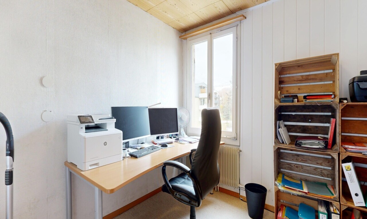 home office featuring radiator heating unit and wood ceiling