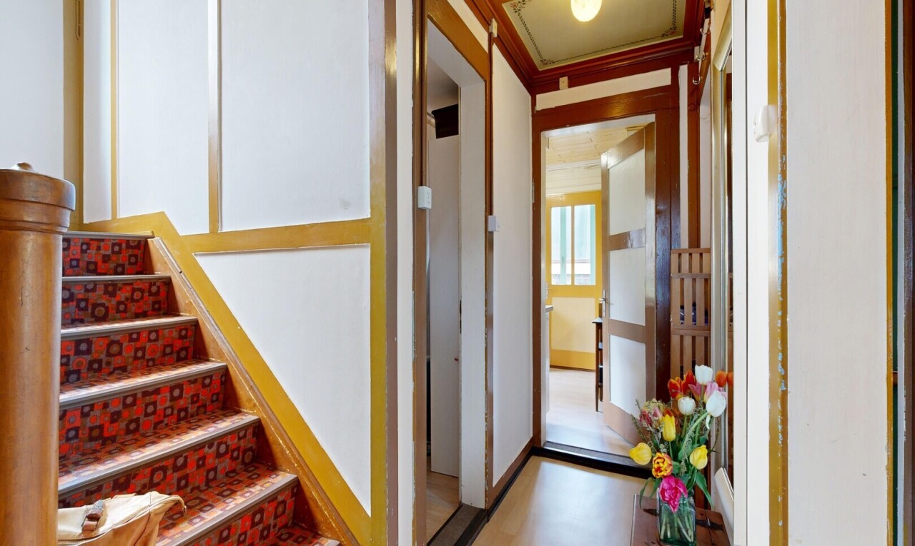 stairs featuring ornamental molding