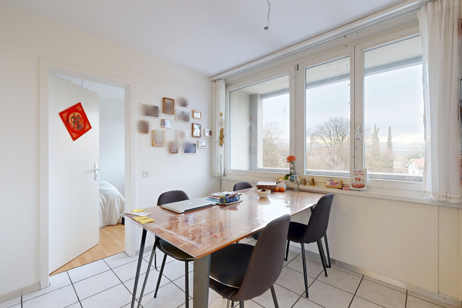 dining space featuring light tile patterned floors
