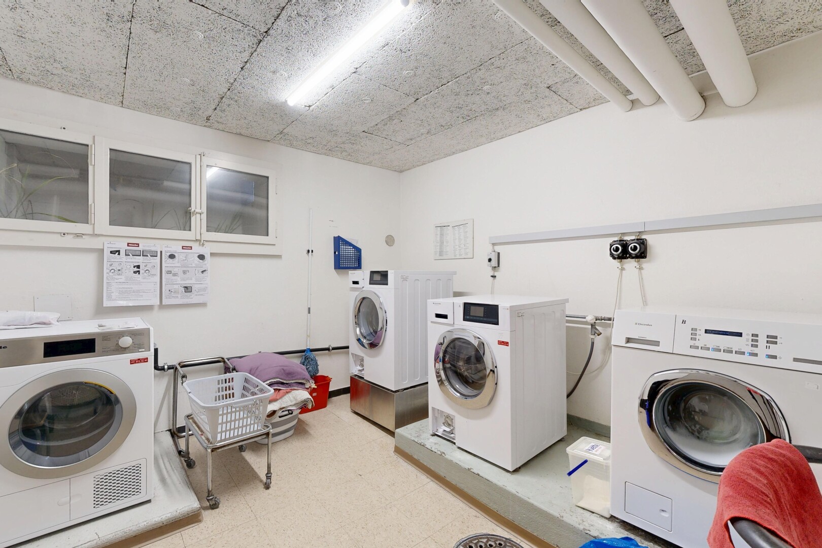 washroom featuring washer and dryer