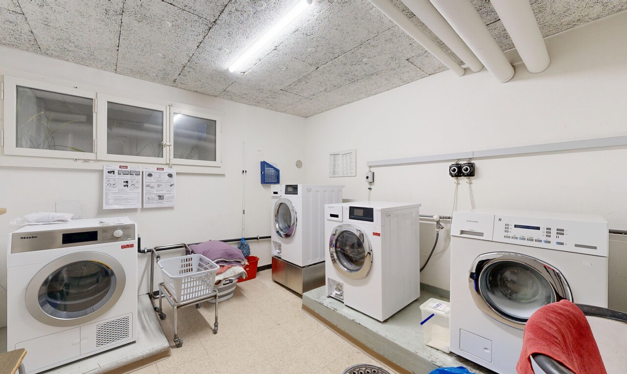 washroom featuring washer and dryer