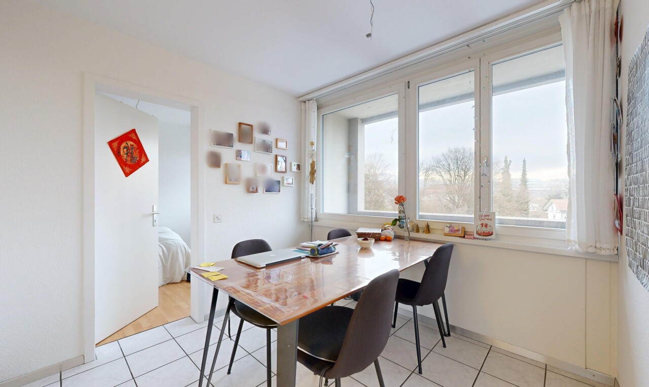 dining space featuring light tile patterned floors