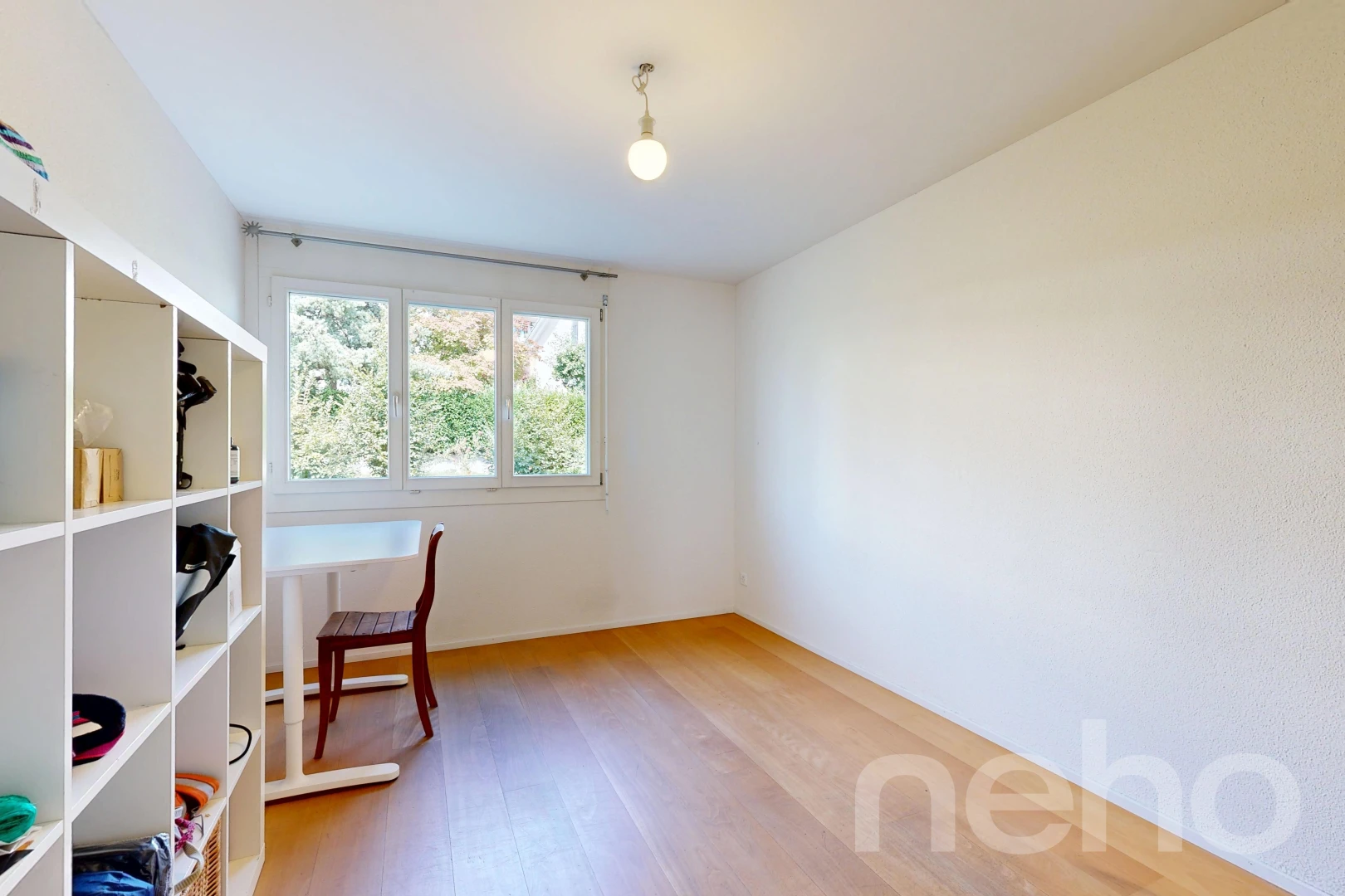 office area with light wood-style floors