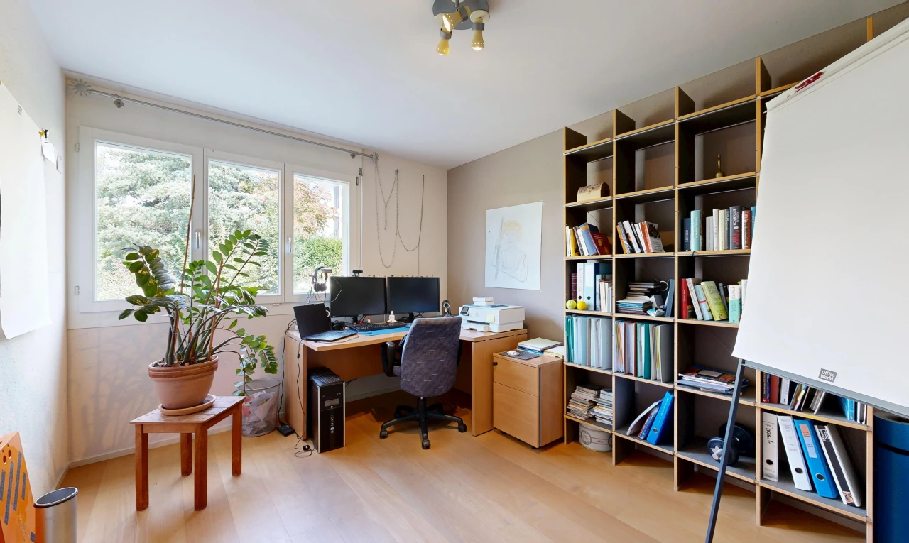 office space with light wood-style flooring