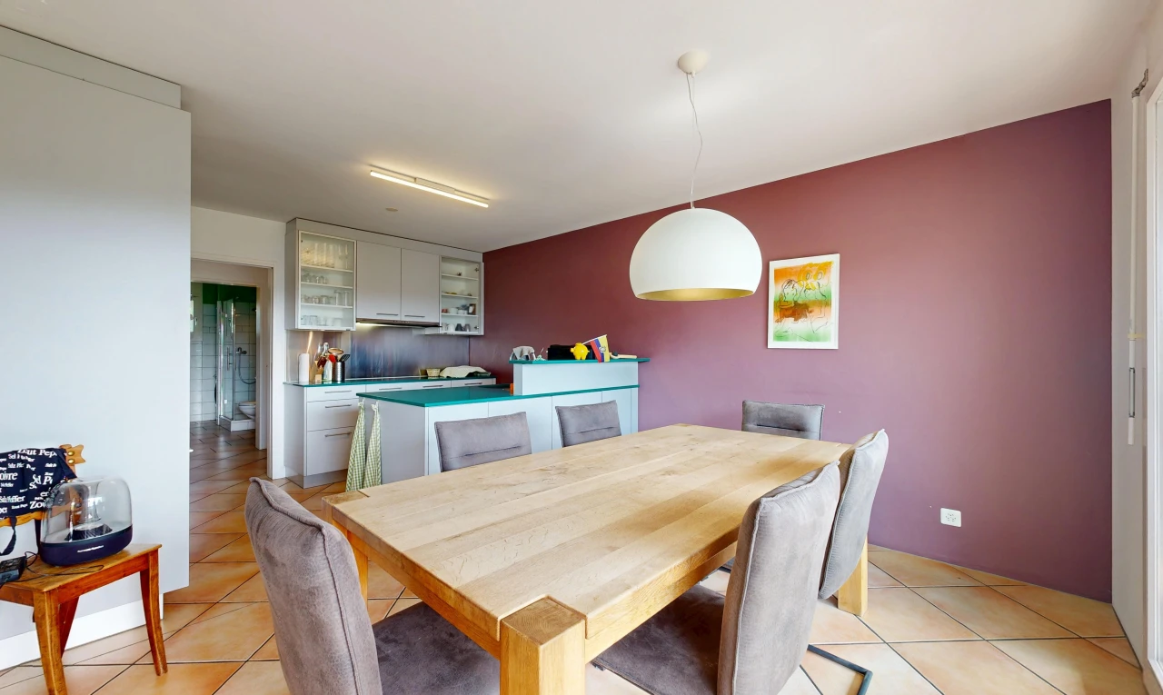 dining space featuring hanging light fixtures and light tile patterned floors