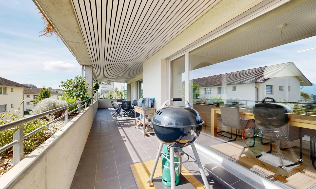 balcony featuring area for grilling