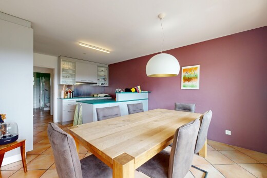 dining space featuring hanging light fixtures and light tile patterned floors