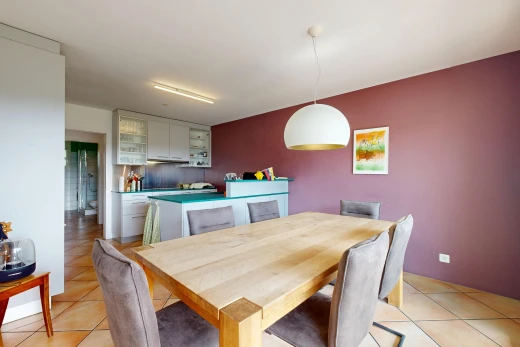dining space featuring hanging light fixtures and light tile patterned floors