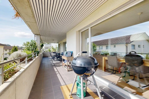 balcony featuring area for grilling