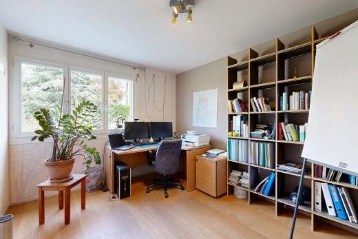 office space with light wood-style flooring