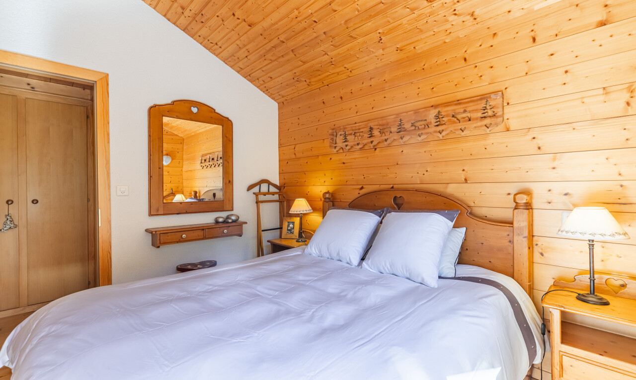 room / bedroom featuring a vaulted wooden ceiling