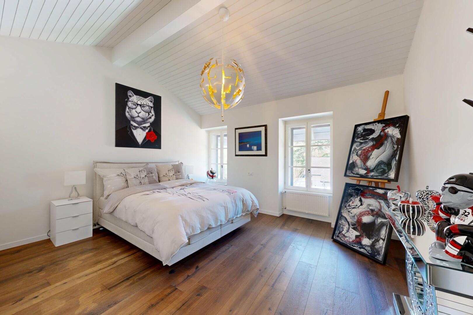 room / bedroom with dark wood-type flooring, beam ceiling, and a chandelier