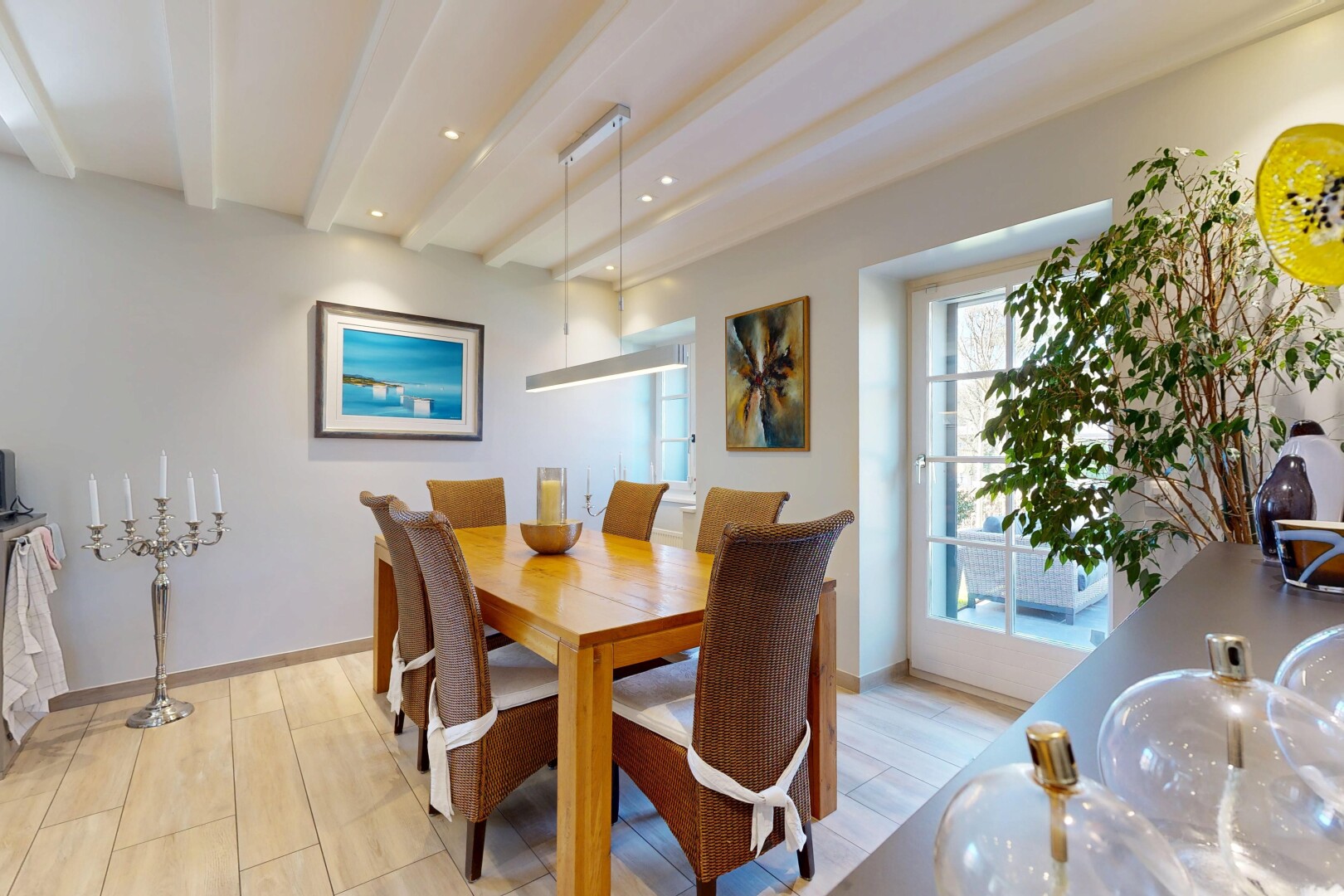 dining area with light wood-style floors, recessed lighting, and beam ceiling