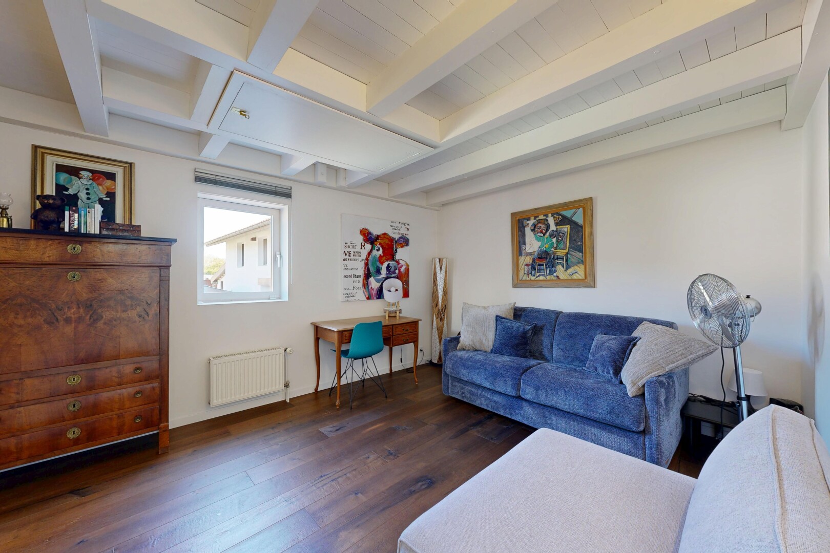 living room with beam ceiling, dark wood-style floors, and radiator