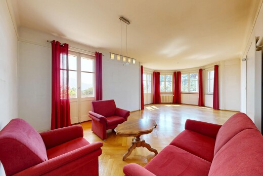 wohnzimmer mit inside property, gipskartonwand, drywall, holzfußboden, und wood finish floor