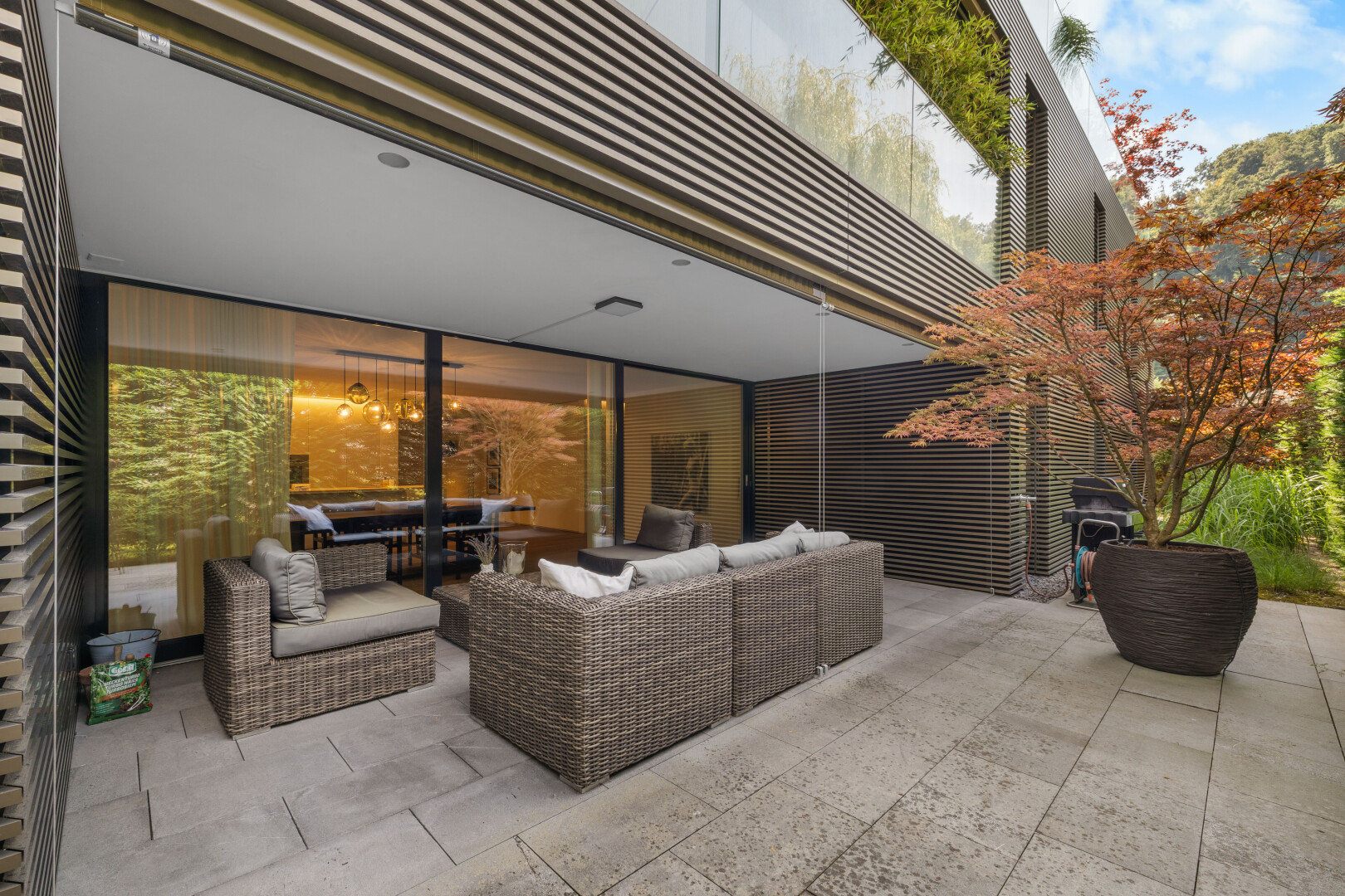 patio / terrace featuring a patio area and an outdoor hangout area