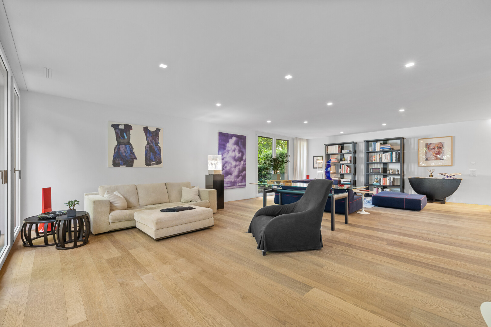 living / dining area with light wood finished floors and recessed lighting