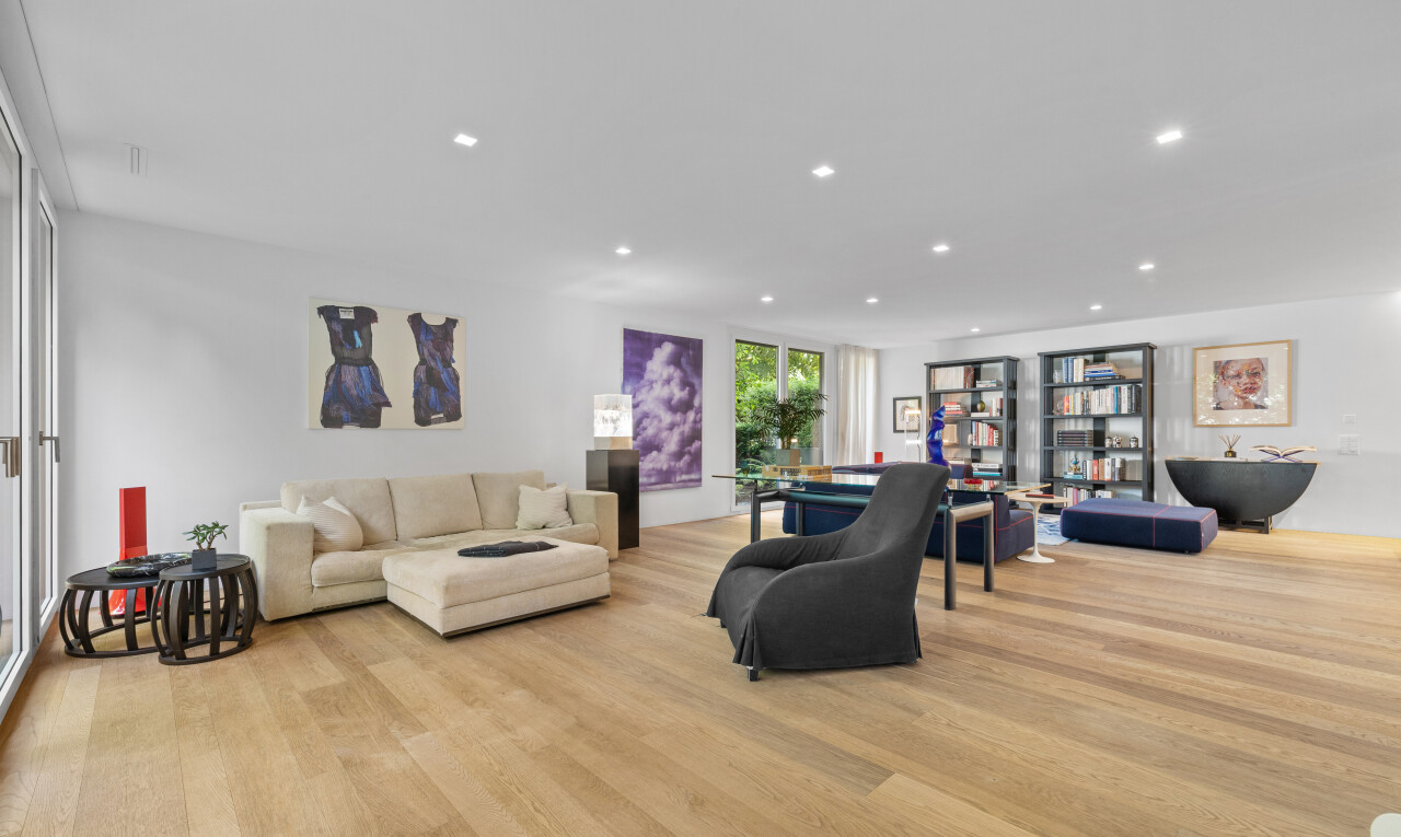 living / dining area with light wood finished floors and recessed lighting