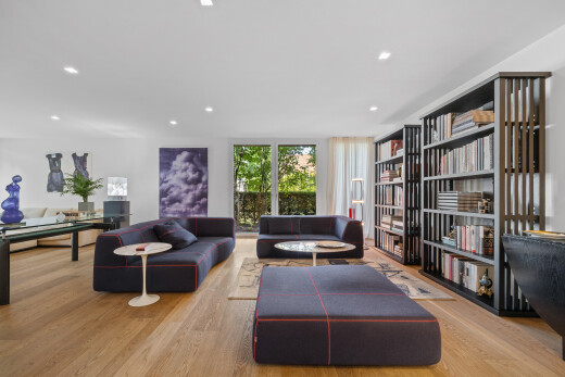 living room featuring light wood-style flooring and recessed lighting
