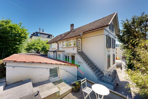 außenansicht mit treppen, day time, stuckverkleidung, schornstein, und property visible