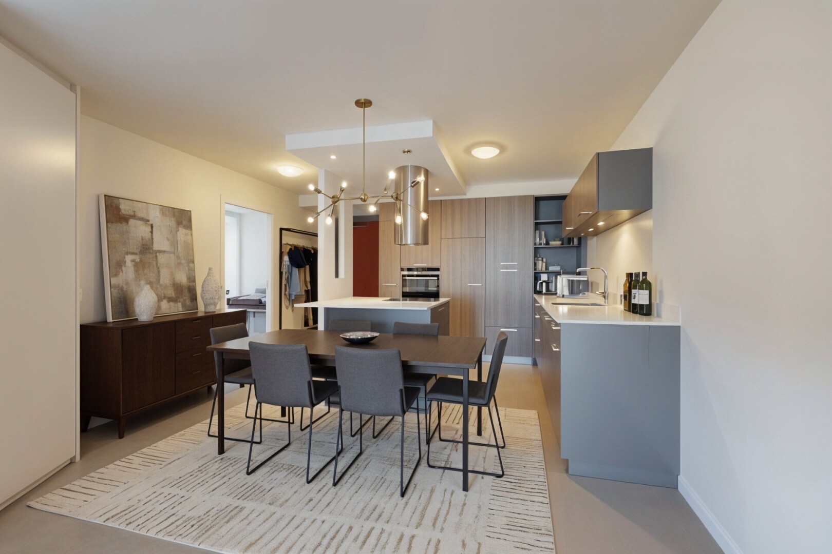 dining area with a sink and hanging lights