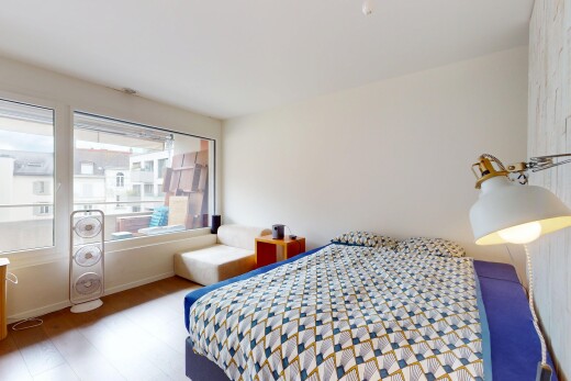 room / bedroom with wood finished floors
