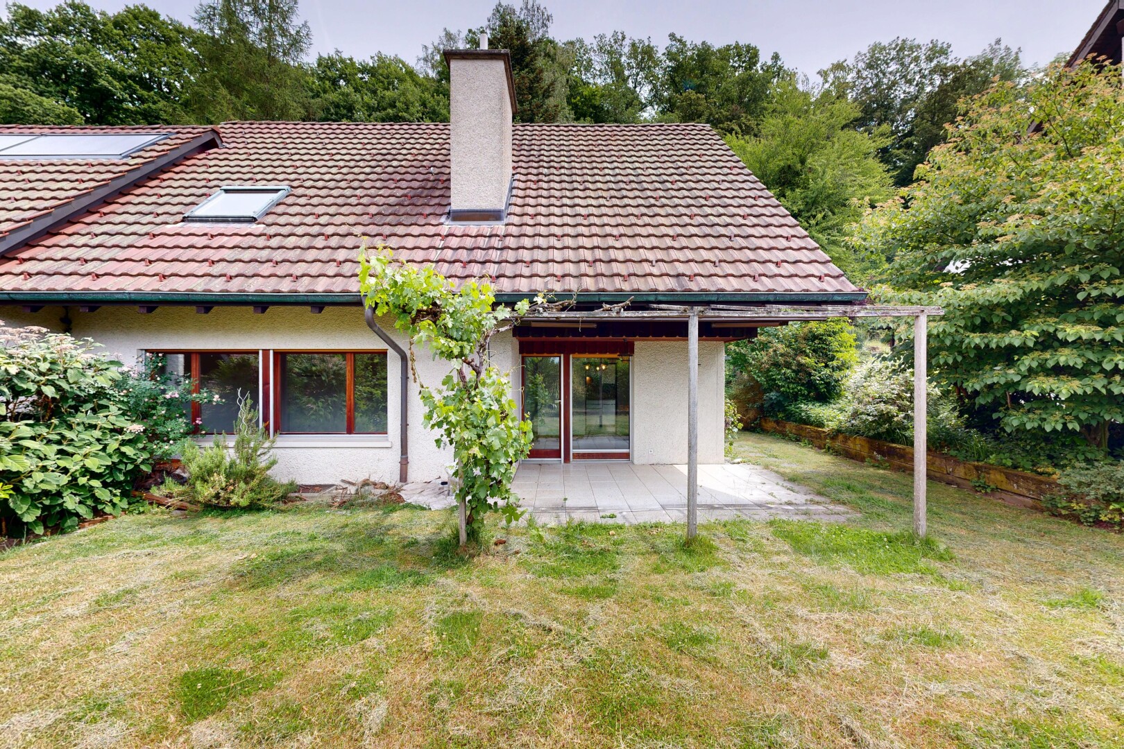außenansicht mit schornstein, ziegeldach, terrasse, from property, und rasen