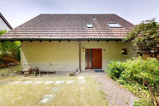 außenansicht mit from property, stuckverkleidung, und ziegeldach