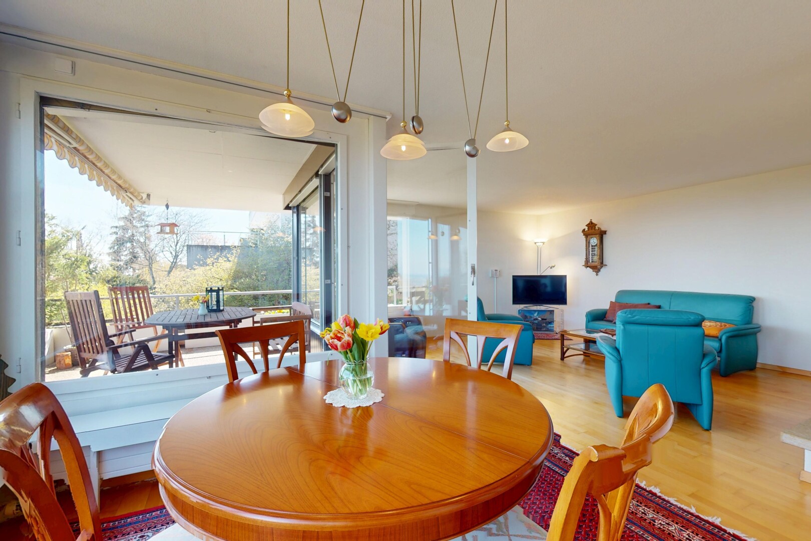 dining area with wood finished floors