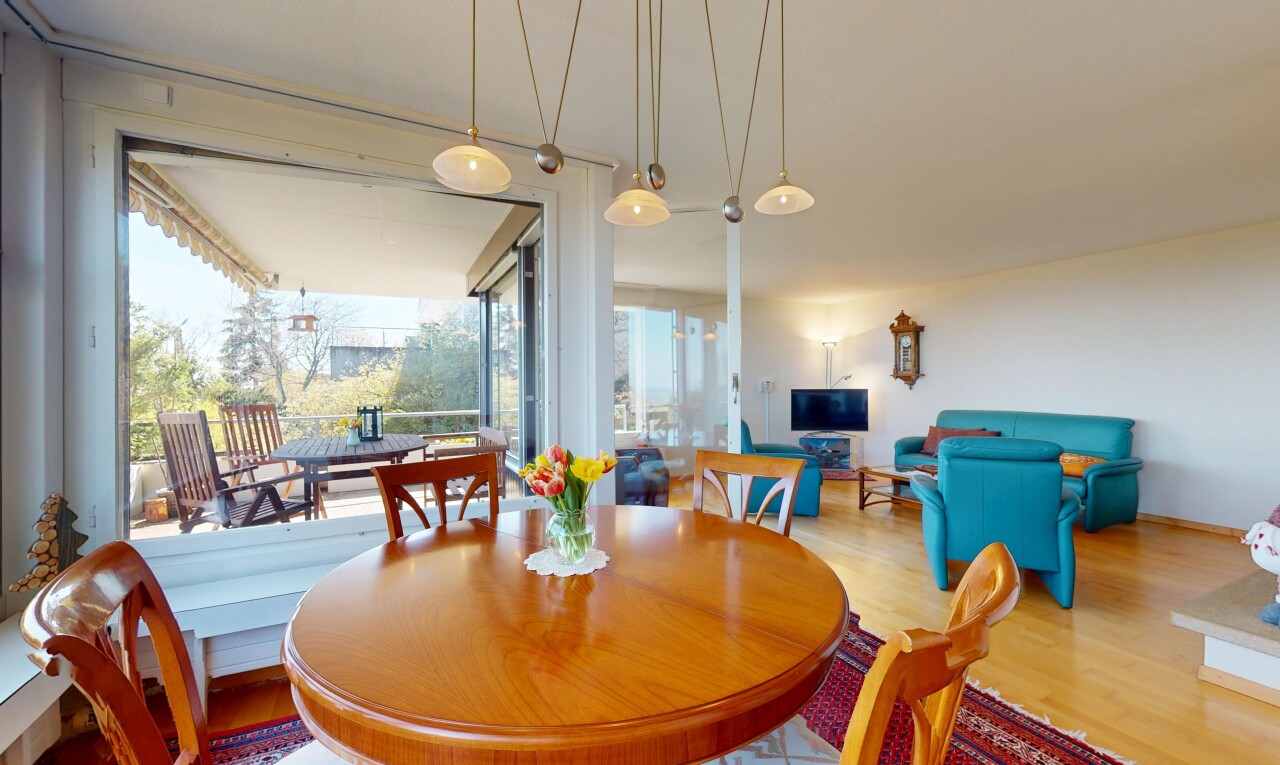 dining area with wood finished floors