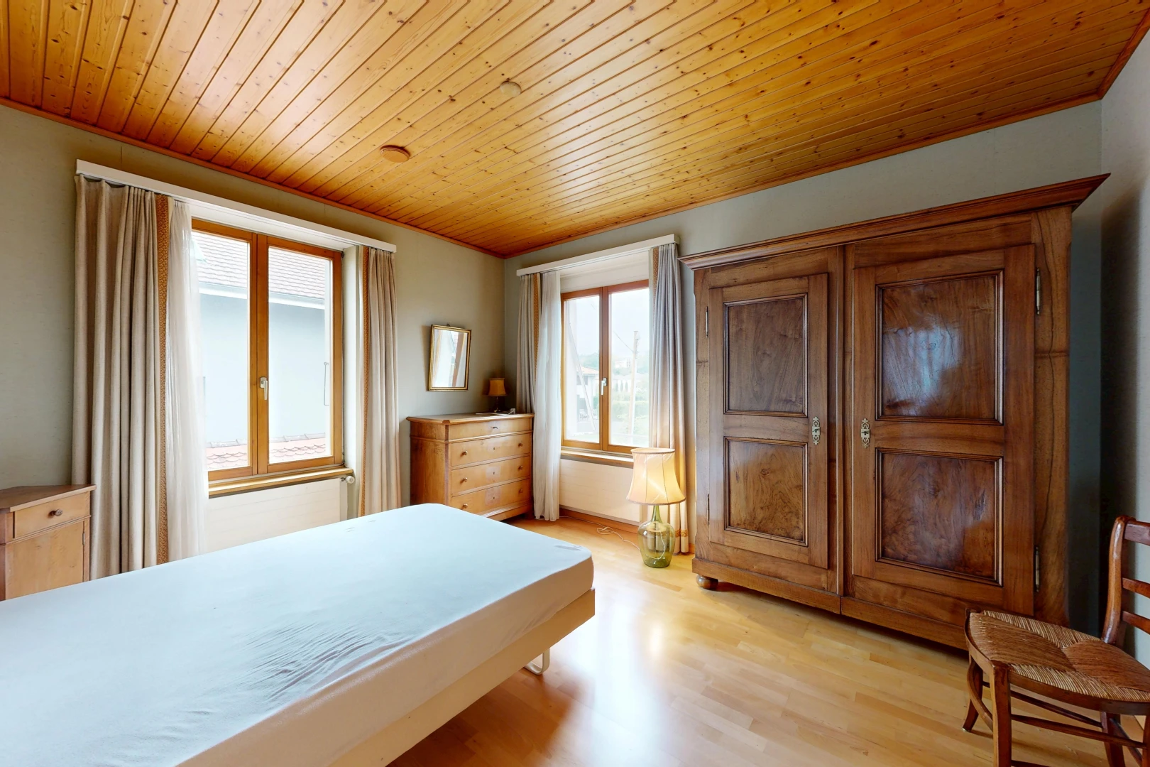 room / bedroom with wooden ceiling and light wood finished floors