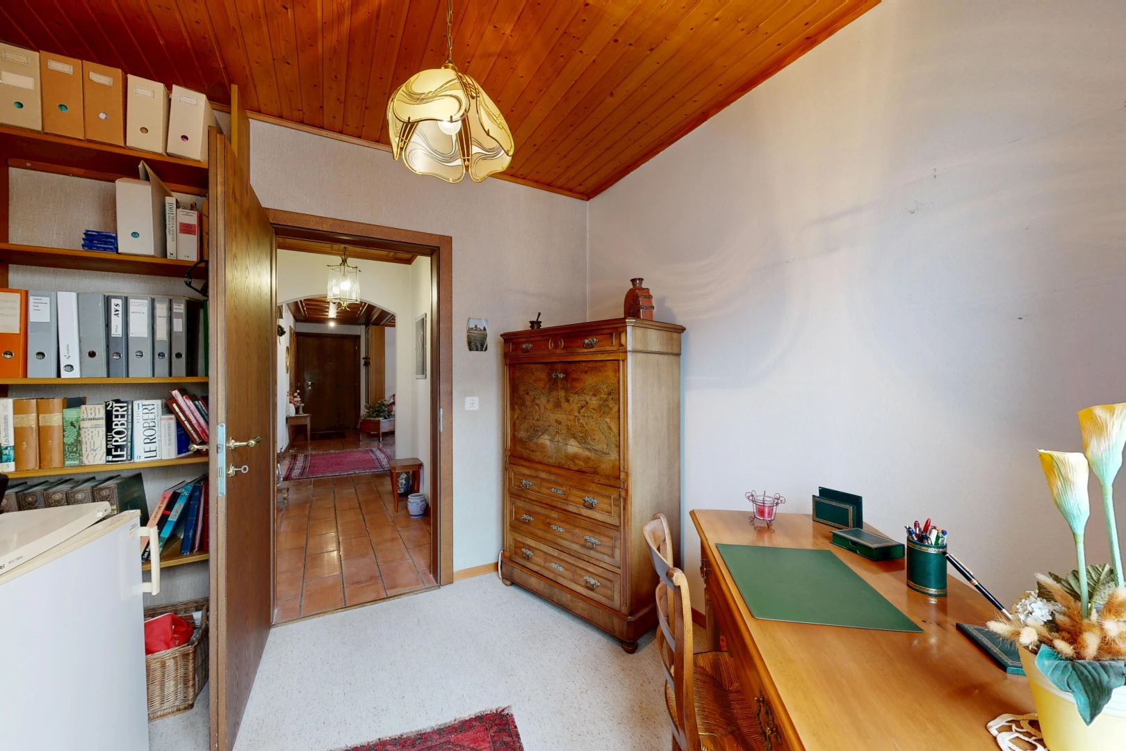 office area featuring wooden ceiling, light colored carpet, and pendant lighting