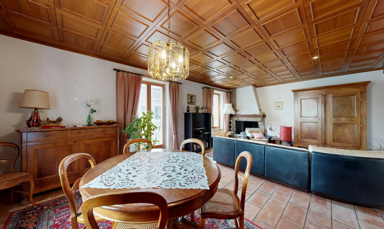 dining space featuring a fireplace