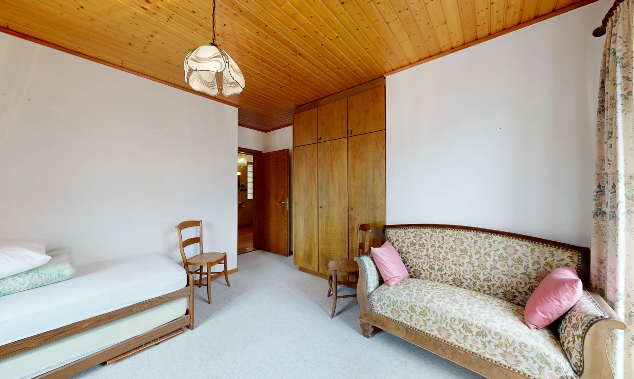 room / bedroom with wooden ceiling, light carpet, a closet, and hanging light fixtures