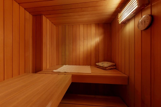 detailed view of wood walls, a sauna, and wooden ceiling