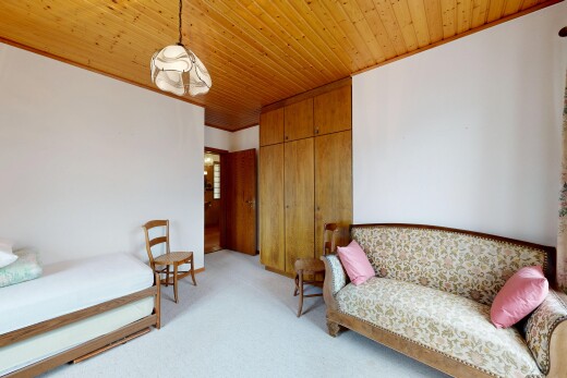 room / bedroom with wooden ceiling, light carpet, a closet, and hanging light fixtures