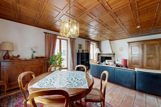 dining space featuring a fireplace