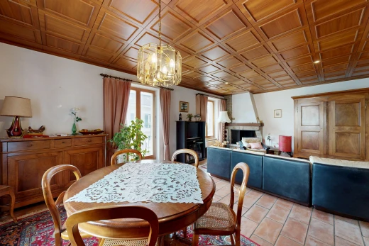 dining space featuring a fireplace