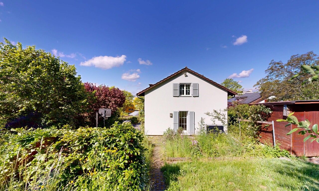façade avec property visible, day time, et bardage en stuc