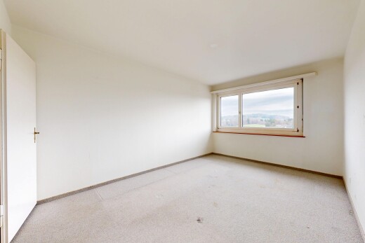 leerer raum mit carpet, teppich, drywall, gipskartonwand, und natural light