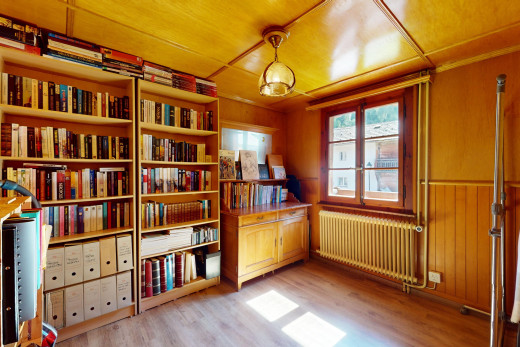 office space with light hardwood / wood-style flooring and radiator heating unit