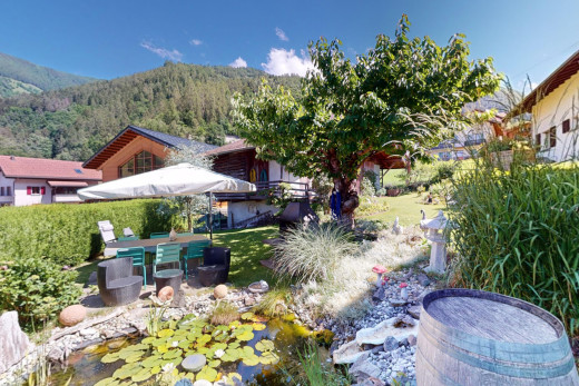 garden with a yard and a mountain view