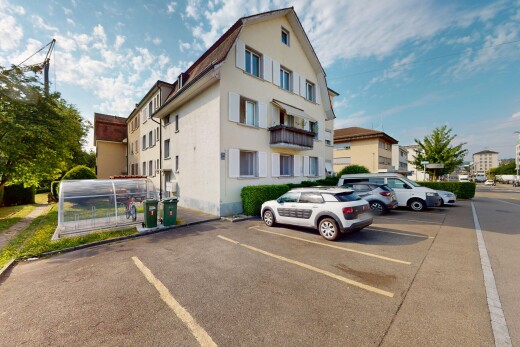 außenansicht mit day time, parkplatz, und property visible