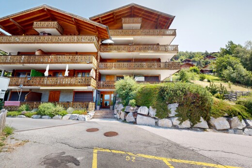 extérieur du bâtiment avec day time, vue sur le complexe d'appartements, et apartment complex view
