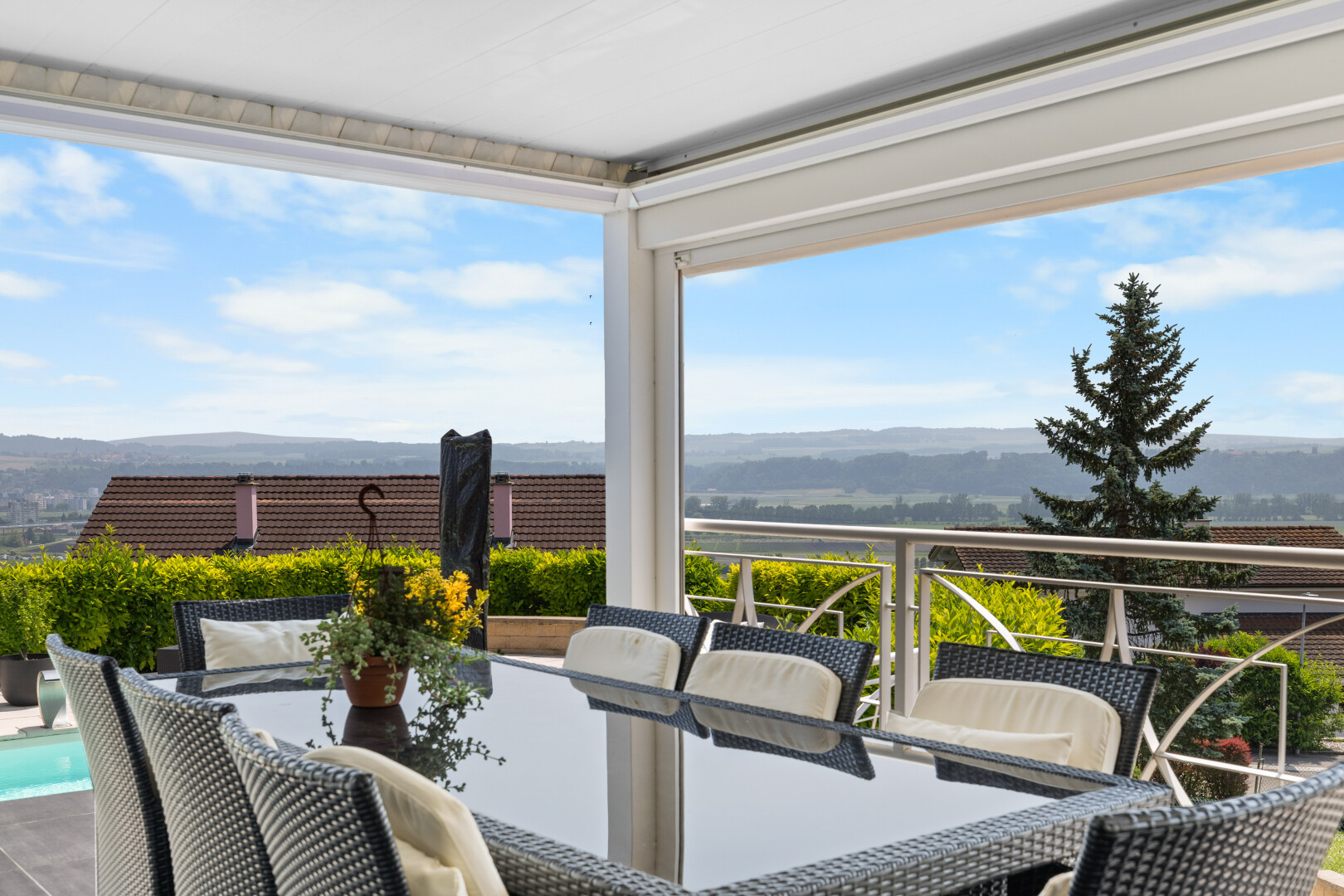 patio / terrace featuring a balcony and outdoor dining area