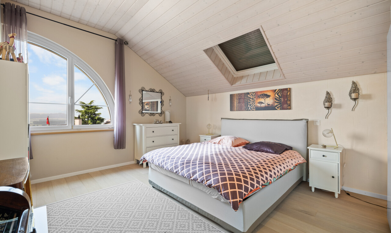 room / bedroom with vaulted ceiling, light wood-style floors, wood ceiling, and a skylight