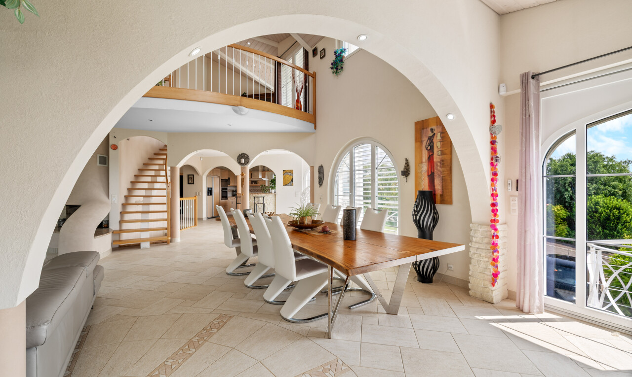 dining space with a high ceiling